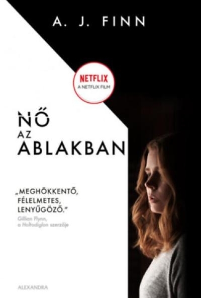 Nő az ablakban